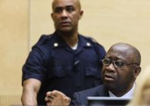 Former Ivory Coast President Laurent Gbagbo attends a confirmation of charges hearing in his pre-trial at the International Criminal Court in The Hague, February 19, 2013. PHOTO BY REUTERS/ Michael Kooren