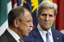 Russian Foreign Minister Sergei Lavrov (L) and U.S. Secretary of State John Kerry speak to the media regarding the current situation in Syria, at the United Nations headquarters in Manhattan, New York, September 30, 2015. PHOTO BY REUTERS/Andrew Kelly