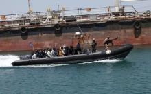 Libyan Navy boat carries illegal migrants who attempted to flee the coast to Europe back to the coastal city of Tripoli, May 5, 2015. PHOTO BY REUTERS/Ismail Zitouny