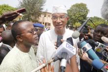 Lionel Zinsou, Benin's Prime Minister and presidential candidate, speaks to journalists after casting his vote during the presidential election in Cotonou, Benin, March 6, 2016. PHOTO BY REUTERS/Akintunde Akinleye