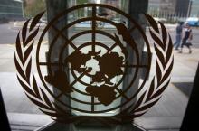 The United Nations logo is seen on one of the front doors at the U.N. Headquarters in New York, August 31, 2013. PHOTO BY REUTERS/Carlo Allegri