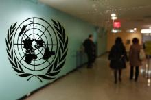 The United Nations logo is displayed on a door at U.N. headquarters in New York, February 26, 2011. PHOTO BY REUTERS/ Joshua Lott