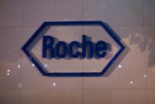 The logo of Swiss pharmaceutical company Roche is seen outside the Shanghai Roche Pharmaceutical Co. Ltd. headquarters in Shanghai