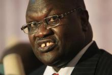 South Sudan's former Vice President Riek Machar speaks during a news conference after meeting north Sudan's Vice President Ali Osman Mohamed Taha in Khartoum