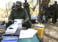 South Sudan's rebel leader Riek Machar sits in the bush in a rebel-controlled territory in Jonglei State