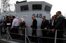 Italian Interior Minister Marco Minniti walks on a boat that was repaired in Italy, after it was handed over to the Libyan navy at Tripoli naval base, Libya, May 15, 2017. PHOTO BY REUTERS/Ismail Zitouny