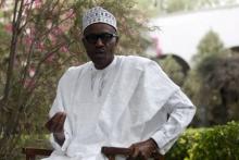 All Progressives Congresses presidential candidate and Nigeria's former military ruler Muhammadu Buhari addresses a news conference outside his house after he voted in Daura, March 28, 2015. PHOTO BY REUTERS/Akintunde Akinleye