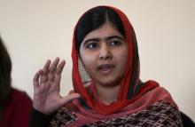 Pakistani schoolgirl activist Malala Yousafzai speaks during a meeting with the leaders of the #BringBackOurGirls Abuja campaign group, in Abuja