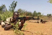 Malian soldiers pause in a firing position during a training session given by soldiers from Luxembourg in Koulikoro, May 7, 2013. PHOTO BY REUTERS/Emilie Regnier