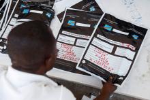 A man re classifies voting materials at Congo's Independent National Electoral Commission (CENI) tallying centre in Kinshasa, Democratic Republic of Congo, January 3, 2019. PHOTO BY REUTERS/Baz Ratner