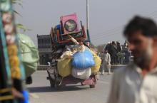 A man fleeing the military offensive against militants in the Khyber Agency, travels on a vehicle laden with his family's belongings on the outskirts of Peshawar in Pakistan's Khyber-Pakhtunkhwa province, October 30, 2014. PHOTO BY REUTERS/Fayaz Aziz