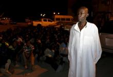 A man detained by a Libyan anti-illegal immigrants unit during an early morning raid on migrants, for smuggling, is pictured at a temporary detention centre, in Tripoli, October 13, 2015. PHOTO BY REUTERS/Hani Amara