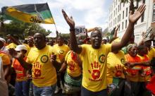 Members of South African President Jacob Zuma's ruling African National Congress (ANC) political party march to the headquarters of the opposition Democratic Alliance (DA) during a march against racism in Cape Town, January 22, 2016. PHOTO BY REUTERS/Mike Hutchings