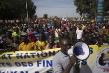 People march against Burkina Faso President Blaise Compaore's plan to change the constitution to stay in power in Ouagadougou, capital of Burkina Faso, October 29, 2014. PHOTO BY REUTERS/Joe Penney