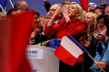 Marine Le Pen, French National Front (FN) political party leader and candidate for French 2017 presidential election, waves to supporters at the end of a political rally in Lille, France, March 26, 2017. PHOTO BY REUTERS/Pascal Rossignol