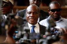 Martin Fayulu, Congolese joint opposition presidential candidate, talks to members of the press as he leaves a meeting regarding the code of good conduct ahead of December 30 elections in Kinshasa, Democratic Republic of Congo, December 29, 2018. PHOTO BY REUTERS/Baz Ratner