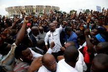 Martin Fayulu, runner-up in Democratic Republic of Congo's presidential election gestures to his supporters as he arrives to a political rally in Kinshasa, Democratic Republic of Congo, January 11, 2019. PHOTO BY REUTERS/Baz Ratne