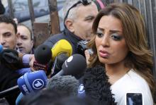 Marwa, fiancee of Canadian-Egyptian Mohamed Fahmy, one of the journalists working for Al Jazeera television, speaks to the media in front of a court in Cairo, January 1, 2015. PHOTO BY REUTERS/Asmaa Waguih