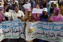 Mauritanian anti-slavery protesters march to demand the liberation of imprisoned abolitionist leader Biram Ould Abeid in Nouakchott, May 26, 2012. PHOTO BY REUTERS/Joe Penney