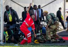 Medics attend to people injured in an explosion during a rally by Zimbabwean President Emmerson Mnangagwa in Bulawayo, Zimbabwe, June 23, 2018. PHOTO BY REUTERS/Tafadzwa Ufumeli