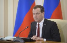 Russia's Prime Minister Dmitry Medvedev chairs a government meeting in the Crimean city of Simferopol
