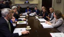 U.S. President Barack Obama meets with members of his national security team and senior staff to receive an update on the Ebola outbreak in West Africa, at the White House in Washington, October 6, 2014. PHOTO BY REUTERS/Kevin Lamarque