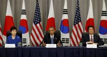 U.S. President Barack Obama takes part in a trilateral meeting with South Korean President Park Geun-Hye (L) and Japanese Prime Minister Shinzo Abe at the Nuclear Security Summit in Washington, March 31, 2016. PHOTO BY REUTERS/Kevin Lamarque
