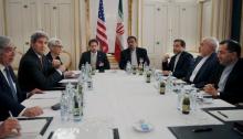 U.S. Secretary of Energy Ernest Moniz, U.S. Secretary of State John Kerry and U.S. Under Secretary for Political Affairs Wendy Sherman (L-3rd L) meet with Iranian Foreign Minister Mohammad Javad Zarif (2nd R) at a hotel in Vienna, Austria, June 28, 2015. PHOTO BY REUTERS/Carlos Barria