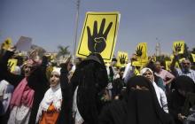 Members of the Muslim Brotherhood and supporters of ousted Egyptian President Mohamed Mursi shout slogans