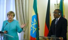 German Chancellor Angela Merkel (L) gestures next to Ethiopian Prime Minister Hailemariam Desalegn (R) during a news conference in Addis Ababa, Ethiopia, October 11, 2016. PHOTO BY REUTERS/Tiksa Negeri