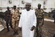 Central African Republic's President Michel Djotodia leaves the presidential palace after speaking with civil society members in Bangui, Central African Republic