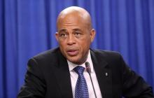 Haitian President Michel Martelly addresses a media conference at the Diplomatic Centre in St Ann's, on the outskirts of the capital Port-of-Spain, November 26, 2013. PHOTO BY REUTERS/Andrea De Silva