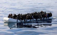 Migrants are seen in a rubber dinghy as they are rescued by Libyan coast guards in the Mediterranean Sea off the coast of Libya, January 15, 2018. PHOTO BY REUTERS/Hani Amara