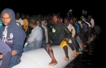 Illegal migrants are seen on a boat that they used, after being detained at a Libyan Navy base in the coastal city of Tripoli, September 20, 2015. PHOTO BY REUTERS/Hani Amara