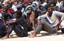 Migrants wait to be transported to an immigration centre in the coastal city of Misrata, Libya, May 9, 2015. PHOTO BY REUTERS/Ismail Zitouny