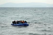 Refugees and migrants on a raft approach the shores of the Greek island of Lesbos, January 29, 2016. PHOTO BY REUTERS/Darrin Zammit Lupi