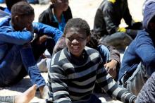 Migrants, who attempted to flee the Libyan coast to head to Europe, are seen after being detained at the coast guard center in the coastal city of Tripoli, Libya, May 16, 2016. PHOTO BY REUTERS/Ismail Zitouny