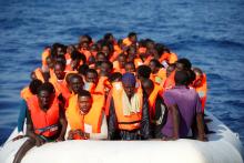 Migrants are seen during rescue operation in the Mediterranean Sea, October 20, 2016. PHOTO BY REUTERS/Yara Nardi/Italian Red Cross press office