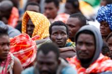 Migrants disembark from a vessel of ONG Medecins sans Frontieres (MSF) in the Sicilian harbour of Augusta, Italy, June 24, 2016. PHOTO BY REUTERS/Antonio Parrinello