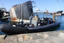 Migrants arrive at a naval base after they were rescued at sea by Libyan coast guard, in Tripoli, Libya, March 3, 2017. PHOTO BY REUTERS/Hani Amara