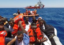 Migrants on a dinghy are rescued by "Save the Children" NGO crew from the ship Vos Hestia in the Mediterranean sea off Libya coast, June 15, 2017. PHOTO BY REUTERS/Stefano Rellandini