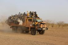 A truck carrying migrants across the Sahara desert to far northern Niger drives outside Agadez, Niger, May 9, 2016. PHOTO BY REUTERS/Joe Penney