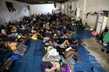 Migrants are seen at the centre of the Anti-Illegal Immigration Authority in Tripoli, Libya, September 10, 2017. PHOTO BY REUTERS/Hani Amara