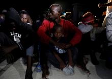 Migrants arrive at a naval base after they were rescued by Libyan coast guard in Tripoli, Libya, July 30, 2018. PHOTO BY REUTERS/Hani Amara