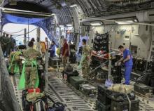 Military personnel attend to seriously injured British nationals on board a Royal Air Force C17 aircraft at Monastir airport in Tunisia, in this June 29, 2015 handout photograph released by Britain's Ministry of Defence in London, June 30, 2015. PHOTO BY REUTERS/MoD Crown Copyright