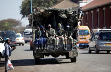 Members of the military patrol the streets of the capital Harare, Zimbabwe, August 2, 2018. PHOTO BY REUTERS/Siphiwe Sibeko