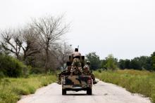 A military vehicle drives along the Konduga-Bama road in Bama, Borno, Nigeria, August 31, 2016. PHOTO BY REUTERS/Afolabi Sotunde