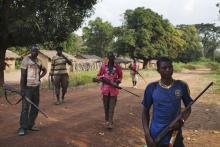 Fighters from a self-defence militia known as anti-balaka guard Mbakate village, Central African Republic