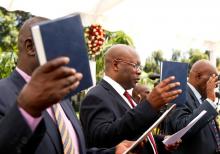 Zimbabwe's Minister of Mines and Mining Development Winston Chitando takes an oath of office with other ministers during a swearing in ceremony at State House in Harare, Zimbabwe, December 4, 2017. PHOTO BY REUTERS/Philimon Bulawayo