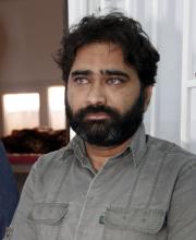 Mirza Noman Baig, the Pakistani captain of the tanker Morning Glory which was seized by U.S. forces after loading oil at a Libyan port held by anti-government rebels, is seen after being detained with the rest of the ship's crew at a police facility in Tripoli